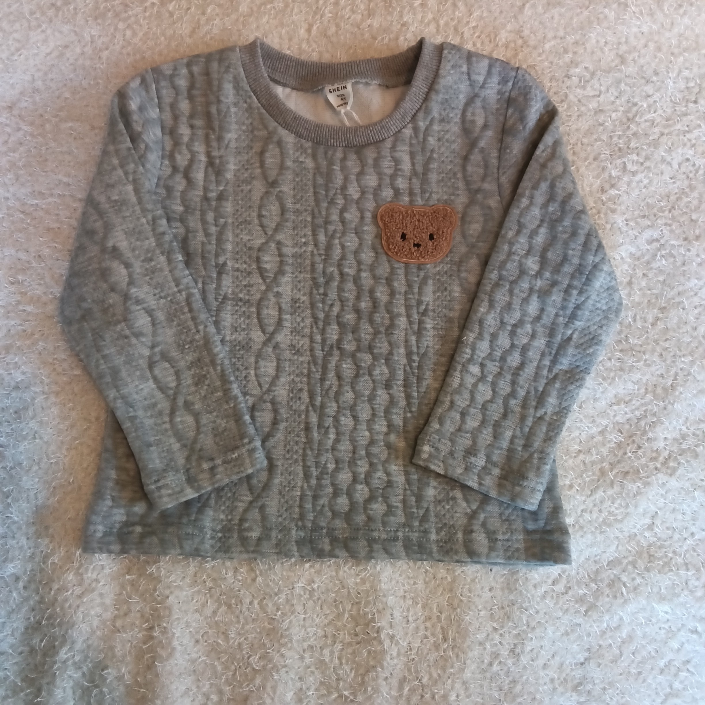 Pull gris.             1159