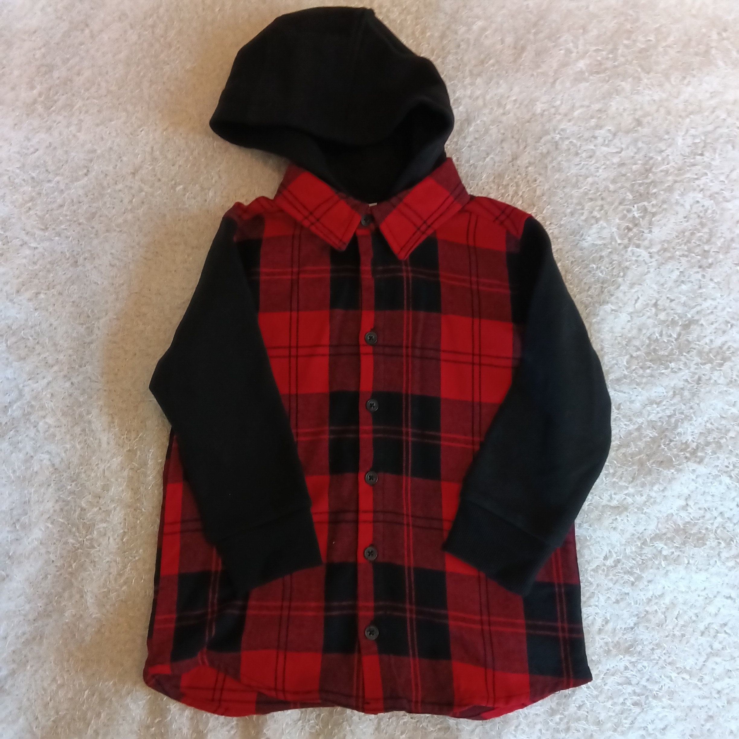 Sur chemise carreaux.   1170